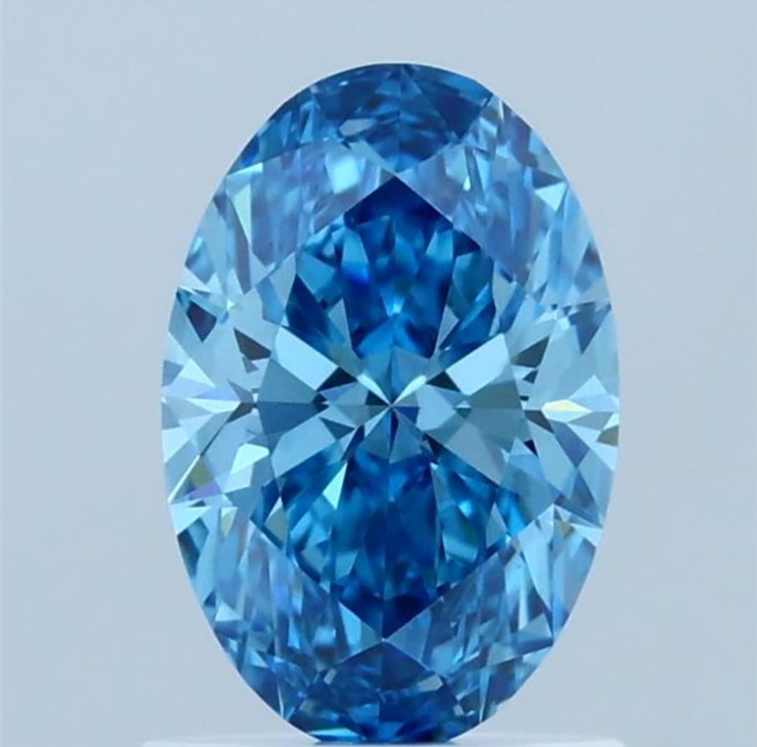 Oval Shape Fancy Vivid Blue Solitaire